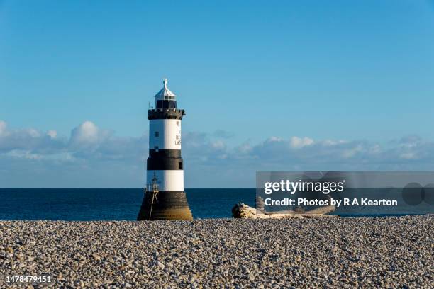 trwyn du lighthouse at penmon point, anglesey, north wales - a point stock pictures, royalty-free photos & images