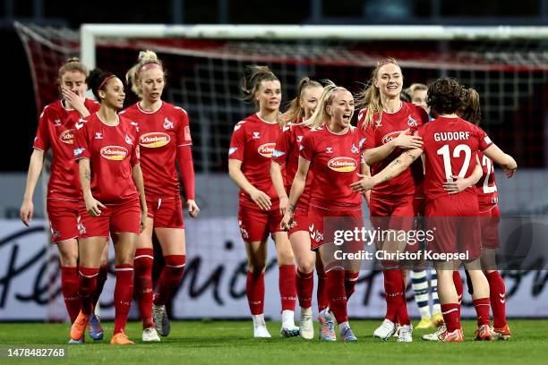 The team of Koeln celebrates the third goal during the FLYERALARM Frauen-Bundesliga match between 1. FC Köln and MSV Duisburg at Suedstadion on March...