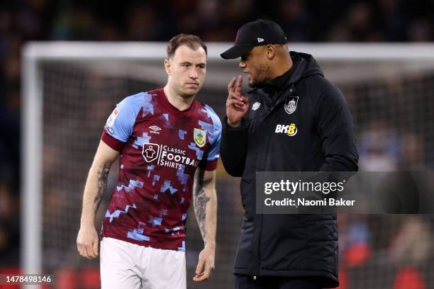 Vincent Kompany, Manager of Burnley, speaks to Ashley Barnes of Burnley prior to the Sky Bet Championship match between Burnley and Sunderland at...