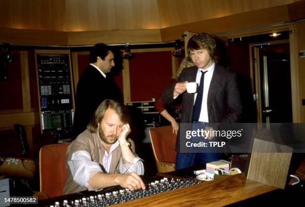 Swedish musicians Benny Andersson and Björn Ulvaeus, of the Swedish supergroup ABBA, sit at the music board at Polar Studios in Stockholm, Sweden,...