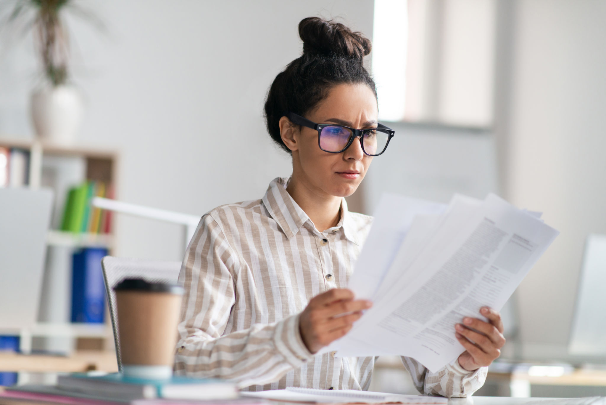 person reviewing documents