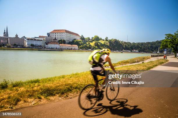 cycling in linz, austria - linz stock pictures, royalty-free photos & images