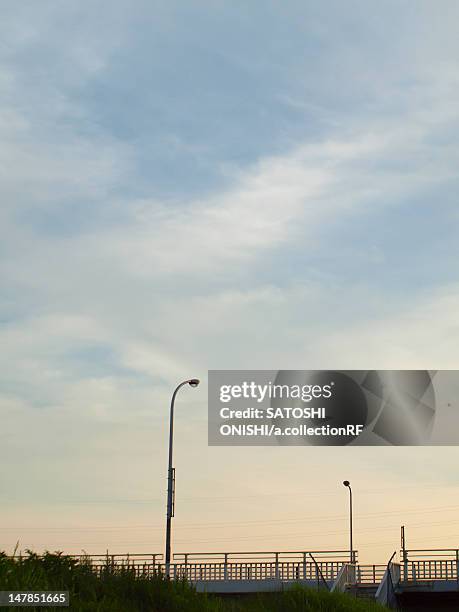 sunset and streetlights - região de kinki imagens e fotografias de stock