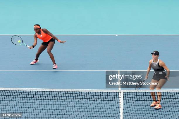 Coco Gauff and Jessica Pegula of United States play Storm Hunter of Australia and Elise Mertens of Belgium during the Miami Open at Hard Rock Stadium...