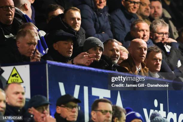 Salford City co-owners Ryan Giggs, Paul Scholes and Nicky Butt watch on during the Sky Bet League Two between Stockport County and Salford City at...