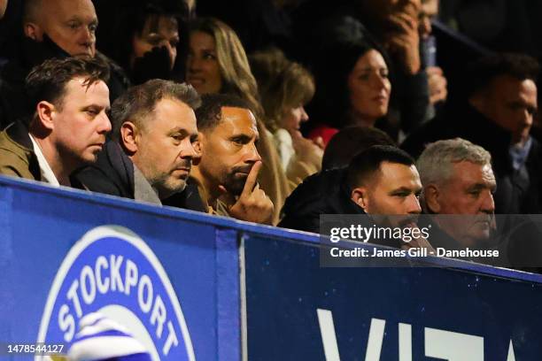 Mark Stott, owner of Stockport County, Rio Ferdinand, Phil Bardsley of Stockport County and Steve Bruce watch on from the stands during the Sky Bet...