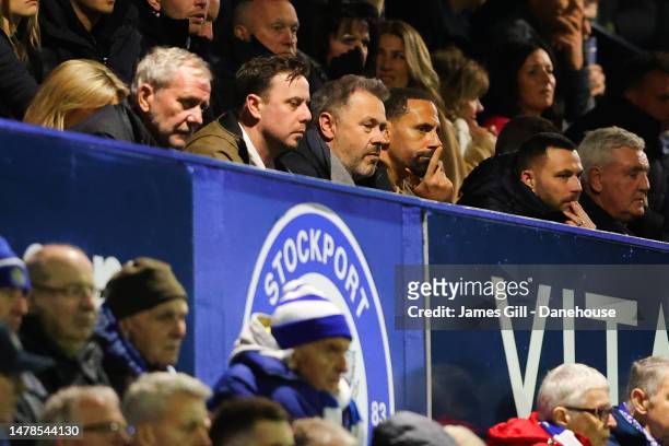 Mark Stott, owner of Stockport County, Rio Ferdinand, Phil Bardsley of Stockport County and Steve Bruce watch on from the stands during the Sky Bet...