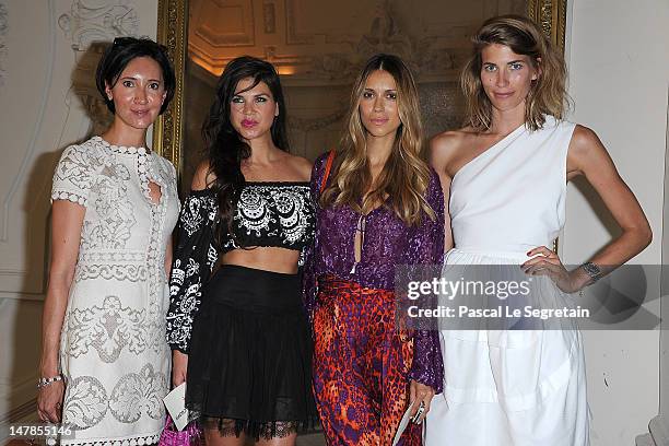 Aleksandra Melnichenko and guests attend the Jean-Paul Gaultier Haute-Couture show as part of Paris Fashion Week Fall / Winter 2012/13 on July 4,...