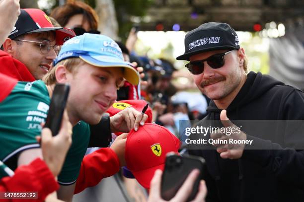 Valtteri Bottas of Finland and Alfa Romeo F1 greets fans on the Melbourne Walk prior to final practice ahead of the F1 Grand Prix of Australia at...