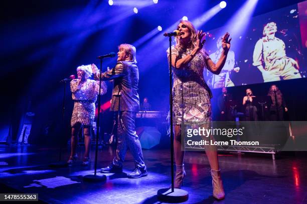 Cheryl Baker, Mike Nolan and Jay Aston of The Fizz perform at Indigo at The O2 on March 31, 2023 in London, England.
