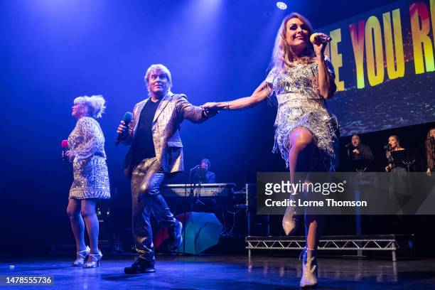 Cheryl Baker, Mike Nolan and Jay Aston of The Fizz perform at Indigo at The O2 on March 31, 2023 in London, England.