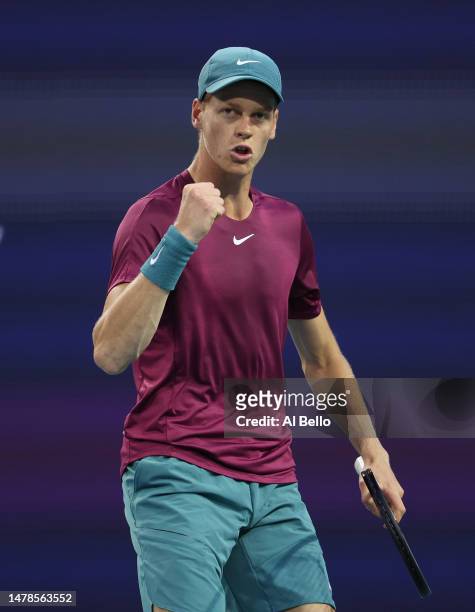 Jannik Sinner of Italy celebrates.against Carlos Alcaraz of Spain during the semifinals of the Miami Open at Hard Rock Stadium on March 31, 2023 in...