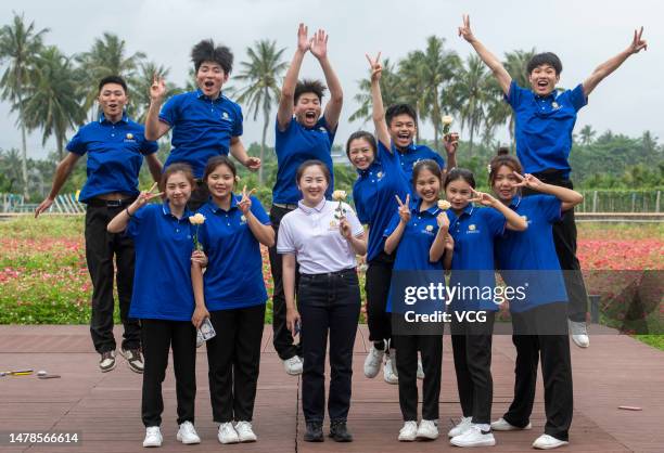 Volunteers pose for a photo as the Boao Forum for Asia Annual Conference 2023 concludes on March 31, 2023 in Boao, Qionghai City, Hainan Province of...