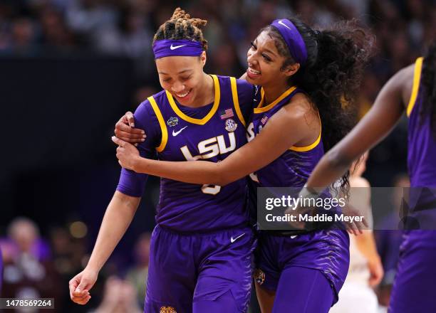 Angel Reese and LaDazhia Williams of the LSU Lady Tigers react after the 79-72 victory over the Virginia Tech Hokies during the 2023 NCAA Women's...