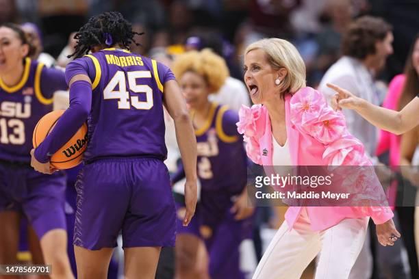 Head coach Kim Mulkey and Alexis Morris of the LSU Lady Tigers react after a 79-72 victory over the Virginia Tech Hokies during the 2023 NCAA Women's...