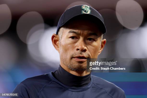 Ichiro Suzuki of the Seattle Mariners looks on before the game against the Cleveland Guardians at T-Mobile Park on March 31, 2023 in Seattle,...