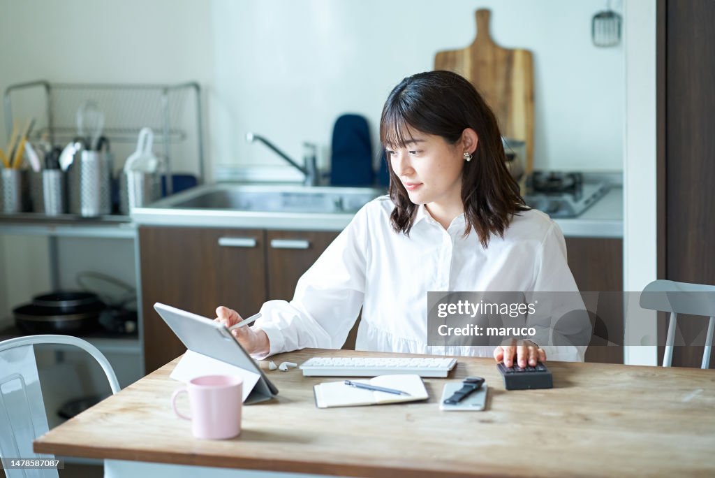Woman working in her room
