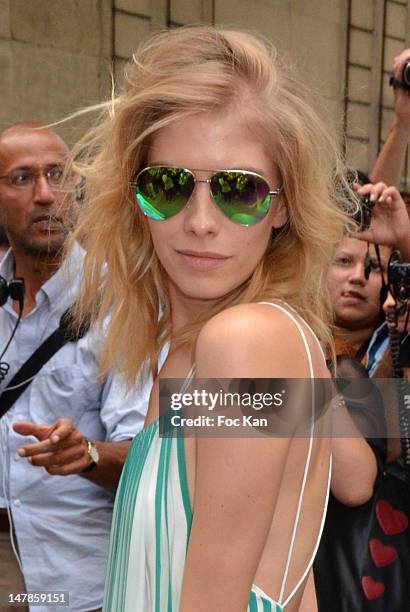 Elena Perminova arrives for the Valentino - Paris Fashion Week Haute Couture F/W 2012/13 at the Hotel Salomon de Rothschild on July 4, 2012 in Paris,...