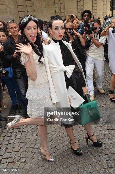 Michelle Harper and a guest arrive for the Valentino - Paris Fashion Week Haute Couture F/W 2012/13 at the Hotel Salomon de Rothschild on July 4,...