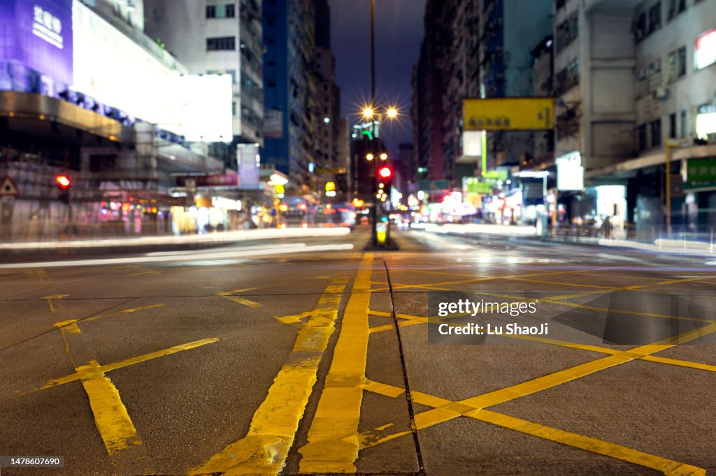 Bustling Hong Kong Streets And Traffic From A Low Angle High-Res Stock