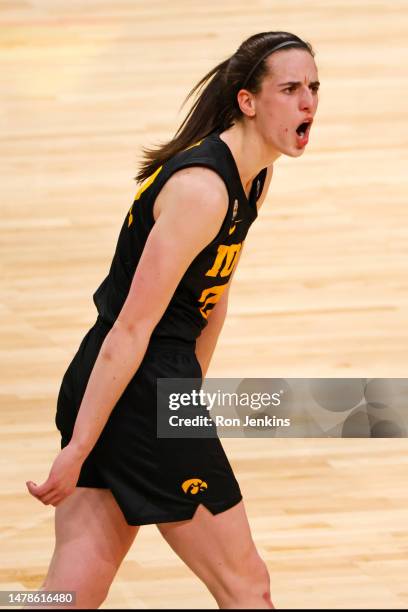 Caitlin Clark of the Iowa Hawkeyes celebrates after the Iowa Hawkeyes beat the South Carolina Gamecocks 77-73 during the 2023 NCAA Women's Basketball...