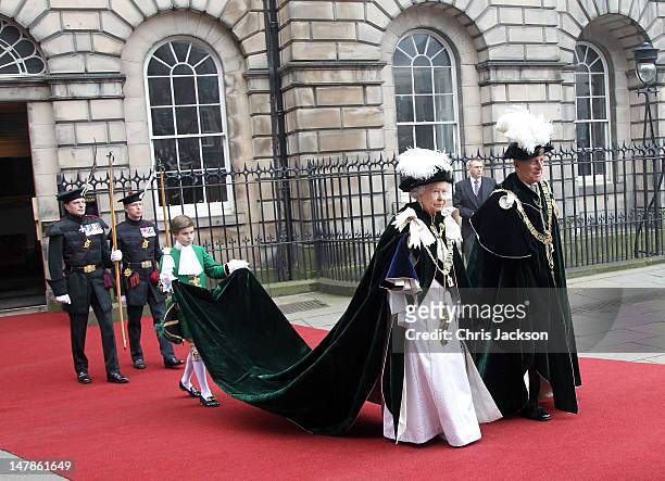 Queen Elizabeth II and Prince Philip, Duke of Edinburgh leave the Signet Library to head to St Giles Cathederal for the Thistle Ceremony on July 5,...