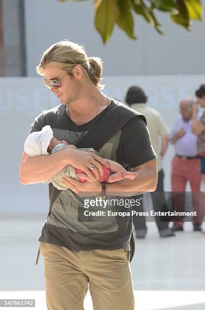 Chris Hemsworth and his daughter India Rose are seen leaving Thyssen Museum on July 4, 2012 in Madrid, Spain.