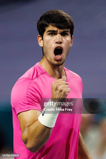 Carlos Alcaraz of Spain celebrates during his match against Jannik Sinner of Italy in the semi-final of the men's singles at the Miami Open at the...