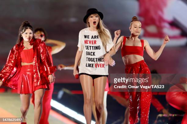 Taylor Swift performs onstage during the "Taylor Swift | The Eras Tour" at AT&T Stadium on March 31, 2023 in Arlington, Texas.