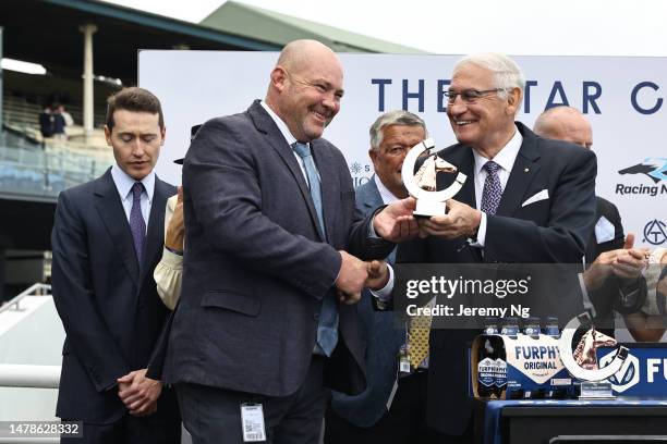 Trainer Peter Moody celebrates as Luke Nolen riding I Wish I Win wins Race 7 Furphy T J Smith Stakes in "The Star Championships Day 1" during Sydney...