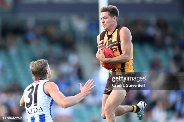 Fergus Greene of the Hawks takes a mark during the round three AFL match between Hawthorn Hawks and North Melbourne Kangaroos at University of...