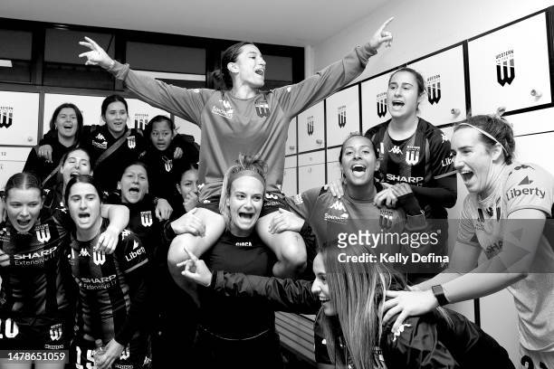 Western United players sing the song after victory in their final regular season match during the round 20 A-League Women's match between Western...