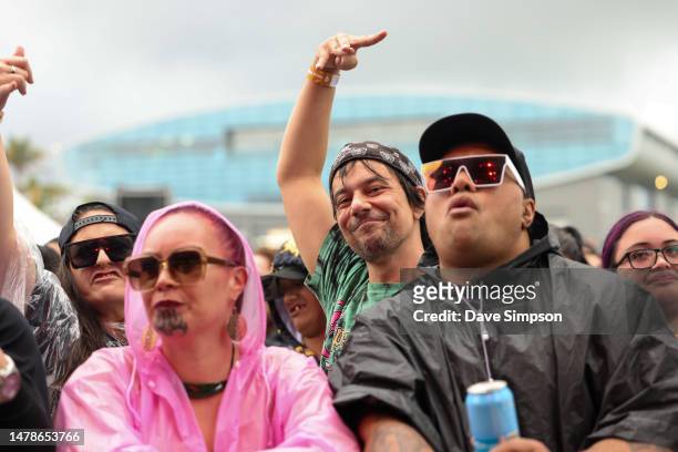 Fans gather in the rain at Room Service with Ice Cube & Cypress Hill at The Trusts Outdoors on stage on April 01, 2023 in Auckland, New Zealand.