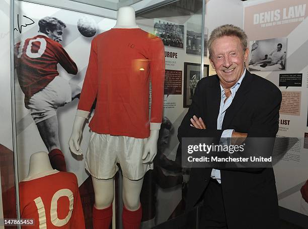 Manchester United legend Denis Law opens an exhibition to mark the 50th anniversary of his signing for Manchester United at the club museum at Old...