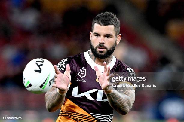 Adam Reynolds of the Broncos catches the ball during the warm up before the round five NRL match between Brisbane Broncos and Wests Tigers at Suncorp...