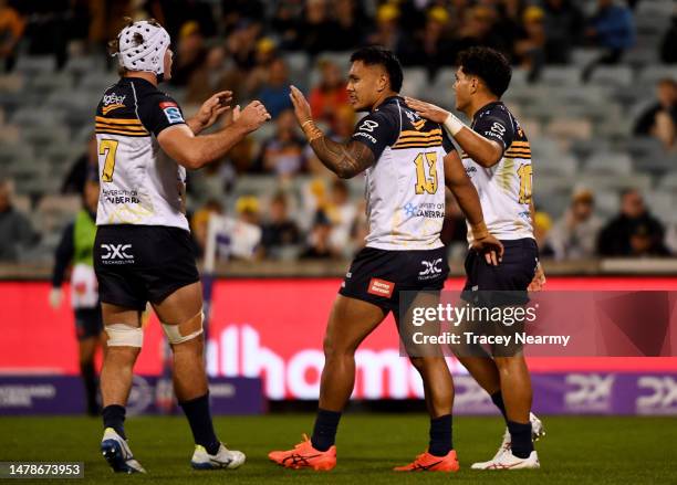 Lenny Ikitau of the Brumbies scores a try during the round six Super Rugby Pacific match between ACT Brumbies and NSW Waratahs at GIO Stadium, on...