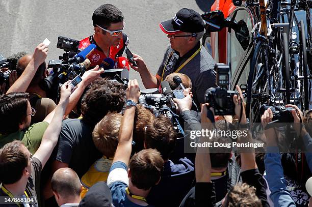 George Hincapie of the USA riding for BMC Racing addresses members of the media prior to the start of stage five of the 2012 Tour de France from...