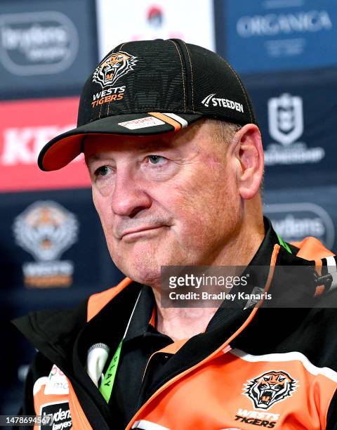 Coach Tim Sheens of the Tigers looks dejected as he speaks at a after match press conference after the round five NRL match between Brisbane Broncos...