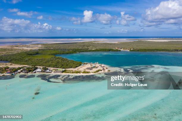 aerial of lac bay with salt pans in distance - bonaire stockfoto's en -beelden