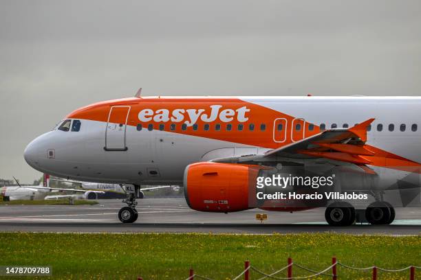 An easyJet aircraft starts her take-off at Humberto Delgado International Airport during the first of a three-day strike by the low cost carrier...