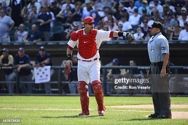 Pierzynski of the Chicago White Sox points toward home plate umpire Angel Campos while arguing a call against the Milwaukee Brewers on June 24, 2012...