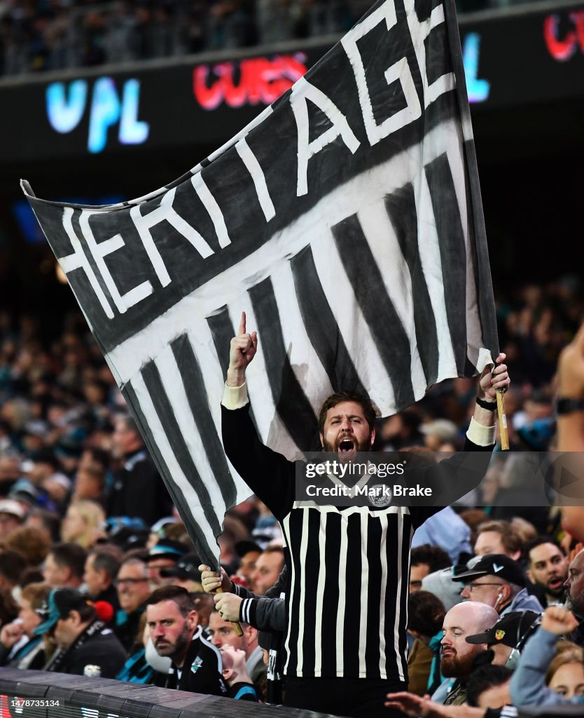 Port Supporters Port Adelaide supporter with his Heritage banner during the round ...