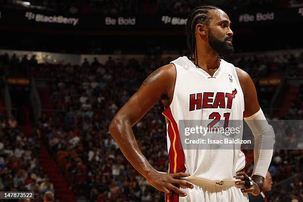Ronny Turiaf stands on the court during the game against the Philadelphia 76ers on April 3, 2012 at American Airlines Arena in Miami, Florida. NOTE...