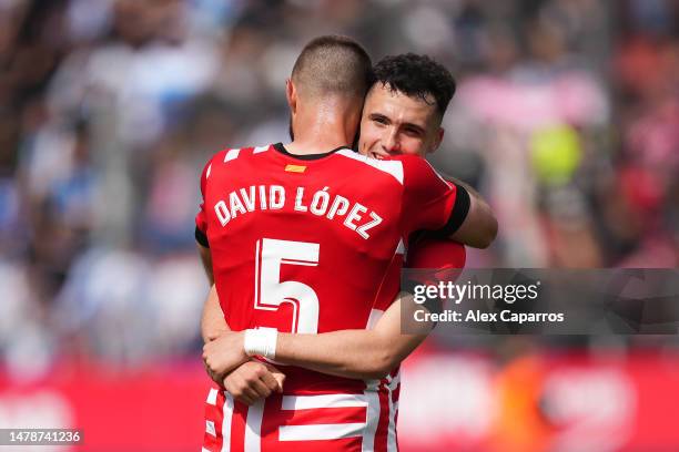 Arnau Martinez and David Lopez of Girona FC embrace after the LaLiga Santander match between Girona FC and RCD Espanyol at Montilivi Stadium on April...