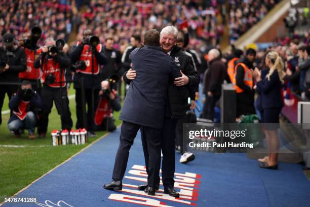 Brendan Rogers, Manager of Leicester City, and Roy Hodgson, Manager of Crystal Palace, interact prior to the Premier League match between Crystal...