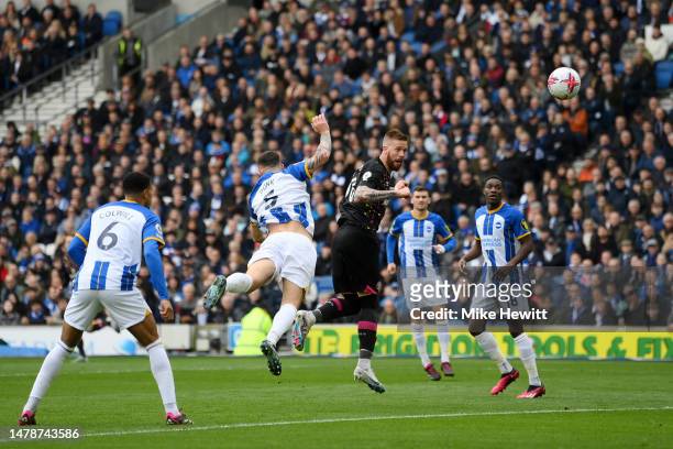 Pontus Jansson of Brentford scores the team's first goal during the Premier League match between Brighton & Hove Albion and Brentford FC at American...