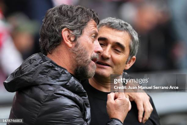 Quique Sanchez Flores, Head Coach of Getafe CF, and Ernesto Valverde, Head Coach of Athletic Club, embrace prior to the LaLiga Santander match...