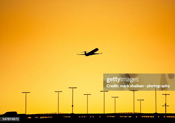 sunset departure - port airport stock pictures, royalty-free photos & images