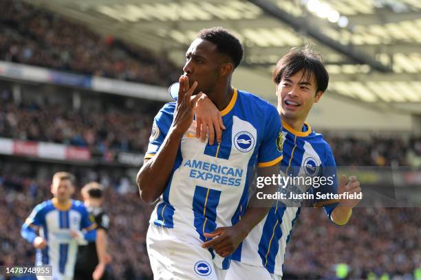 Danny Welbeck of Brighton & Hove Albion celebrates with teammate Kaoru Mitoma after scoring the team's second goal during the Premier League match...