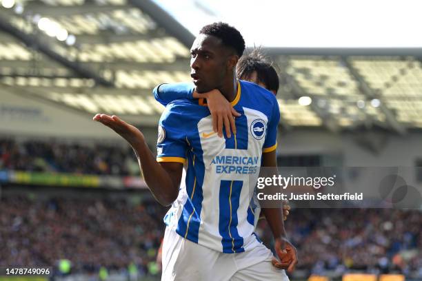 Danny Welbeck of Brighton & Hove Albion celebrates with teammate Kaoru Mitoma after scoring the team's second goal during the Premier League match...